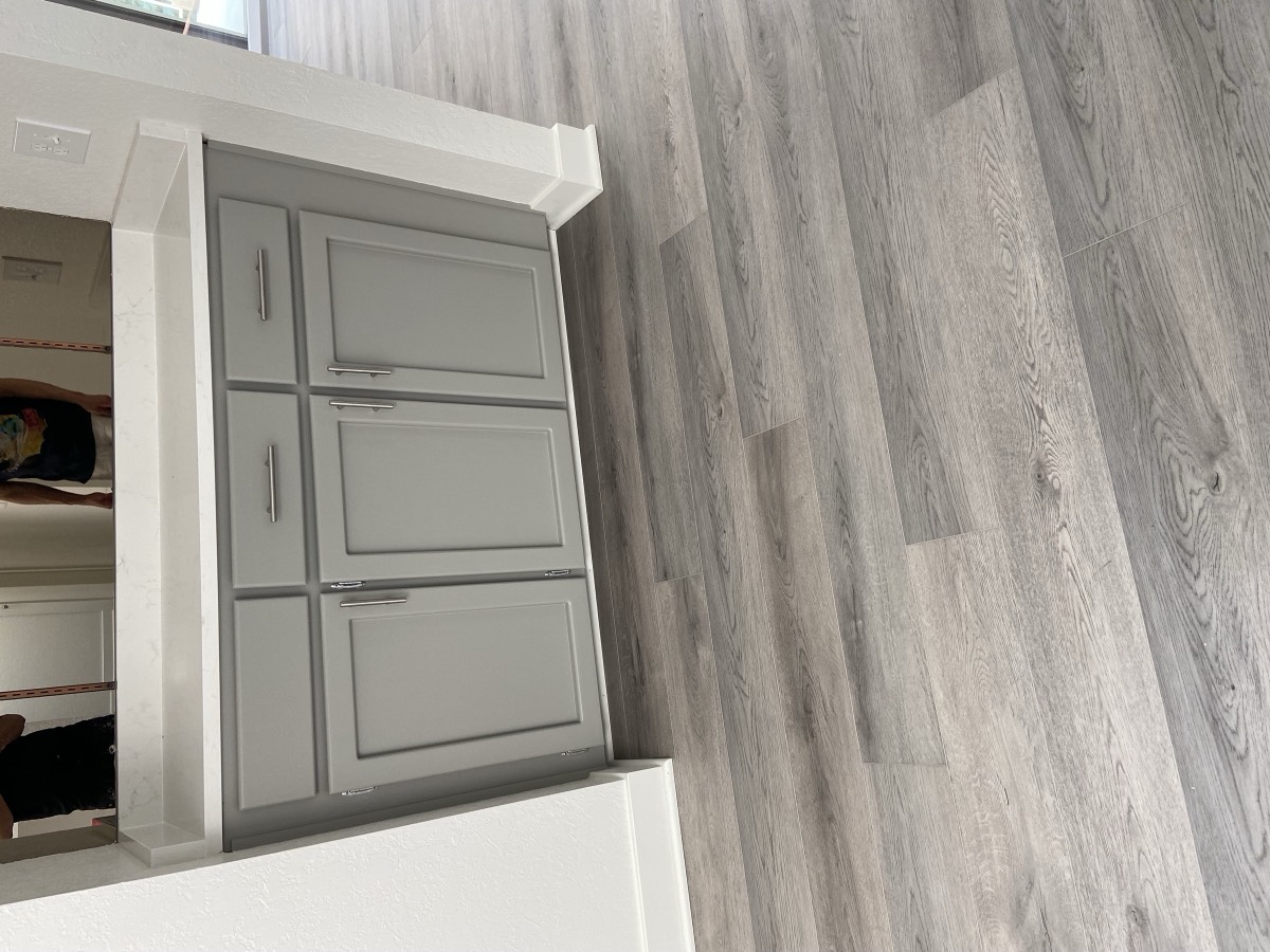 Bathroom vanity cabinets refinished in gray