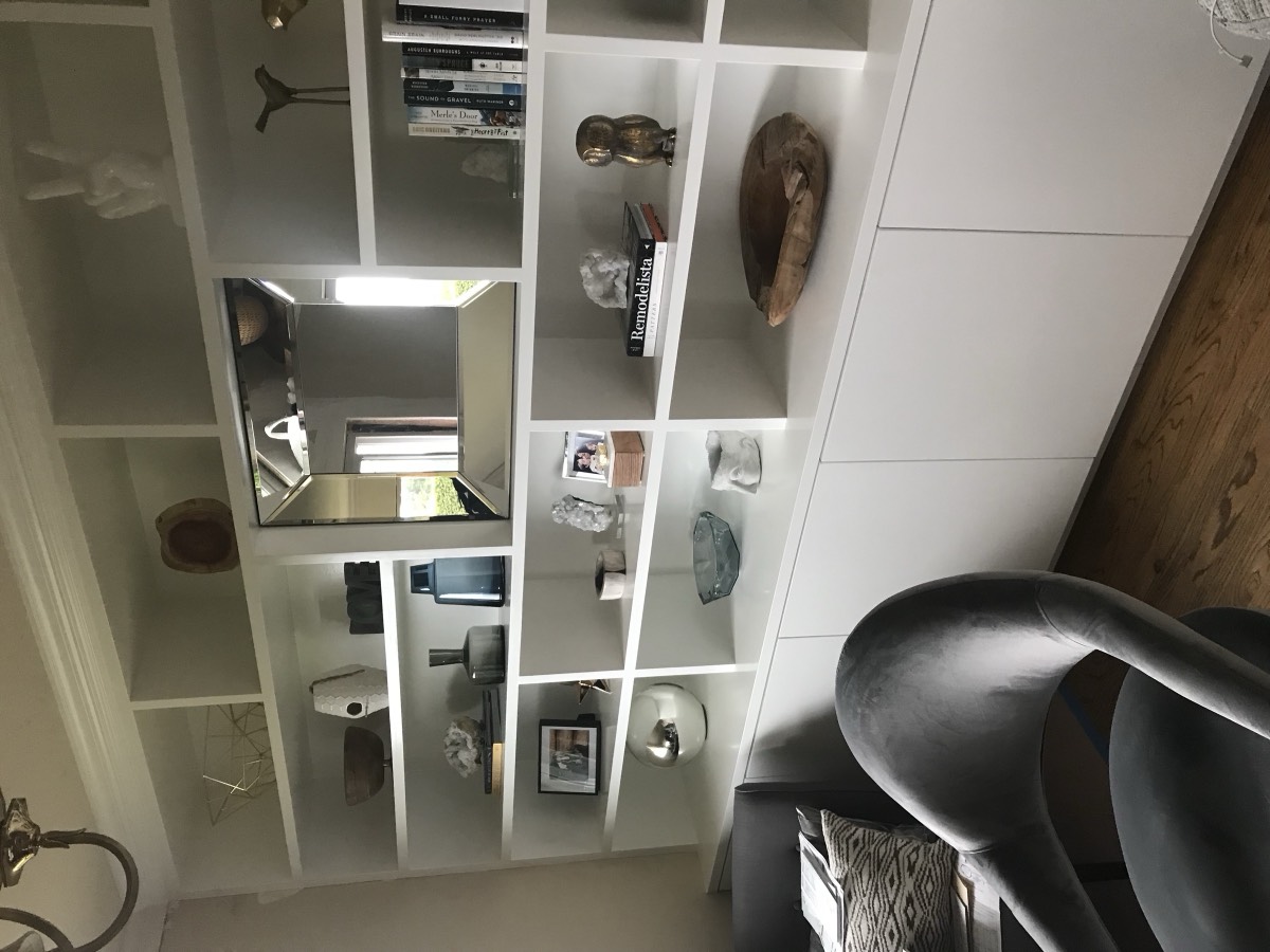 Built-in living room shelving finished in white